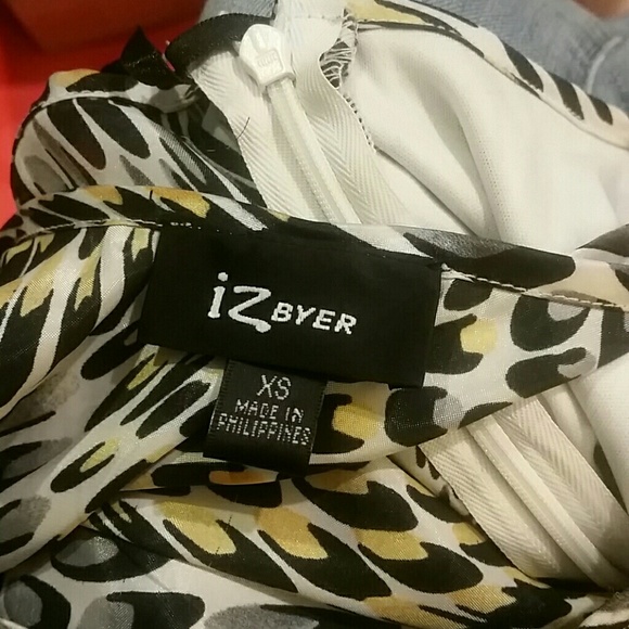 IZ Byer Black and White Animal Print Ruffled Blouse - Picture 4 of 5